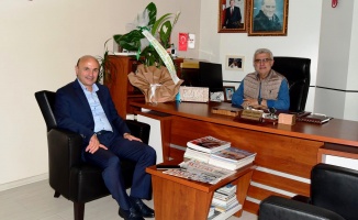 Metin Oral, Muhtarlar Derneği Başkanı'nı kutladı